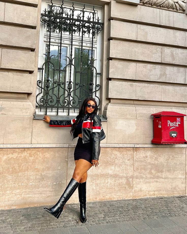 Mini Jean Skirt, Black Top, Black Leather Jacket, and Knee-High Boots